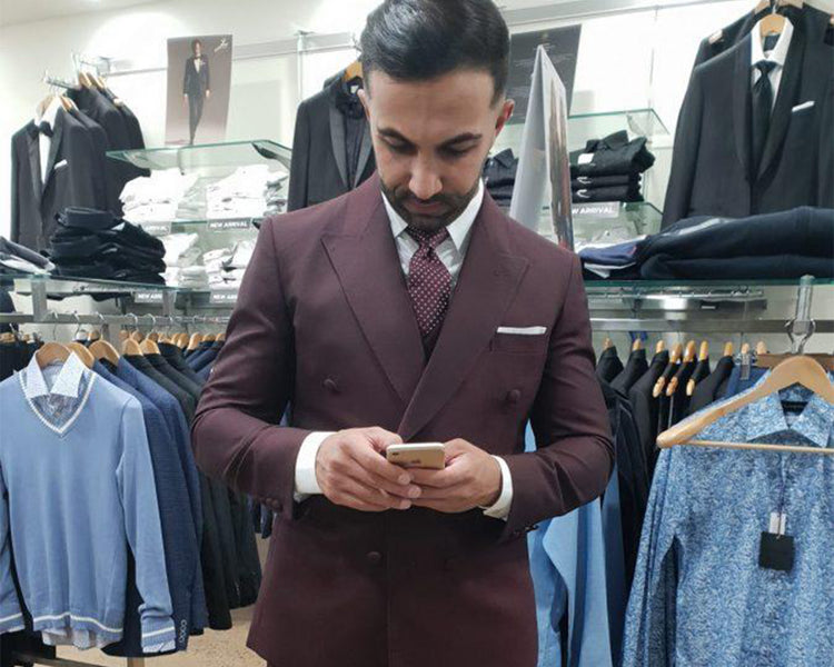 Ali picking up his bespoke suit!